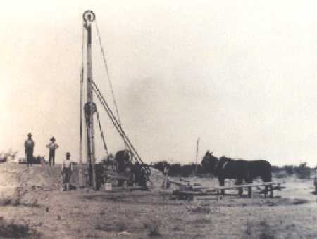 The Land was rich, but dry. Here is an early day drilling rig